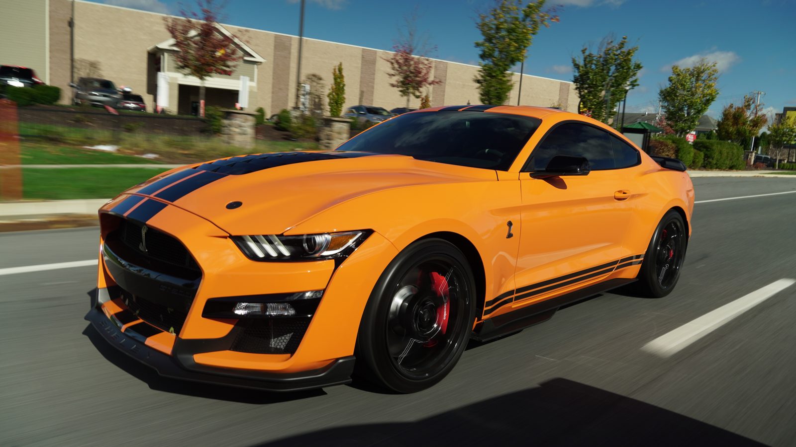 Orange Shelby GT500 maintained year-round on a monthly detailing plan in Towson