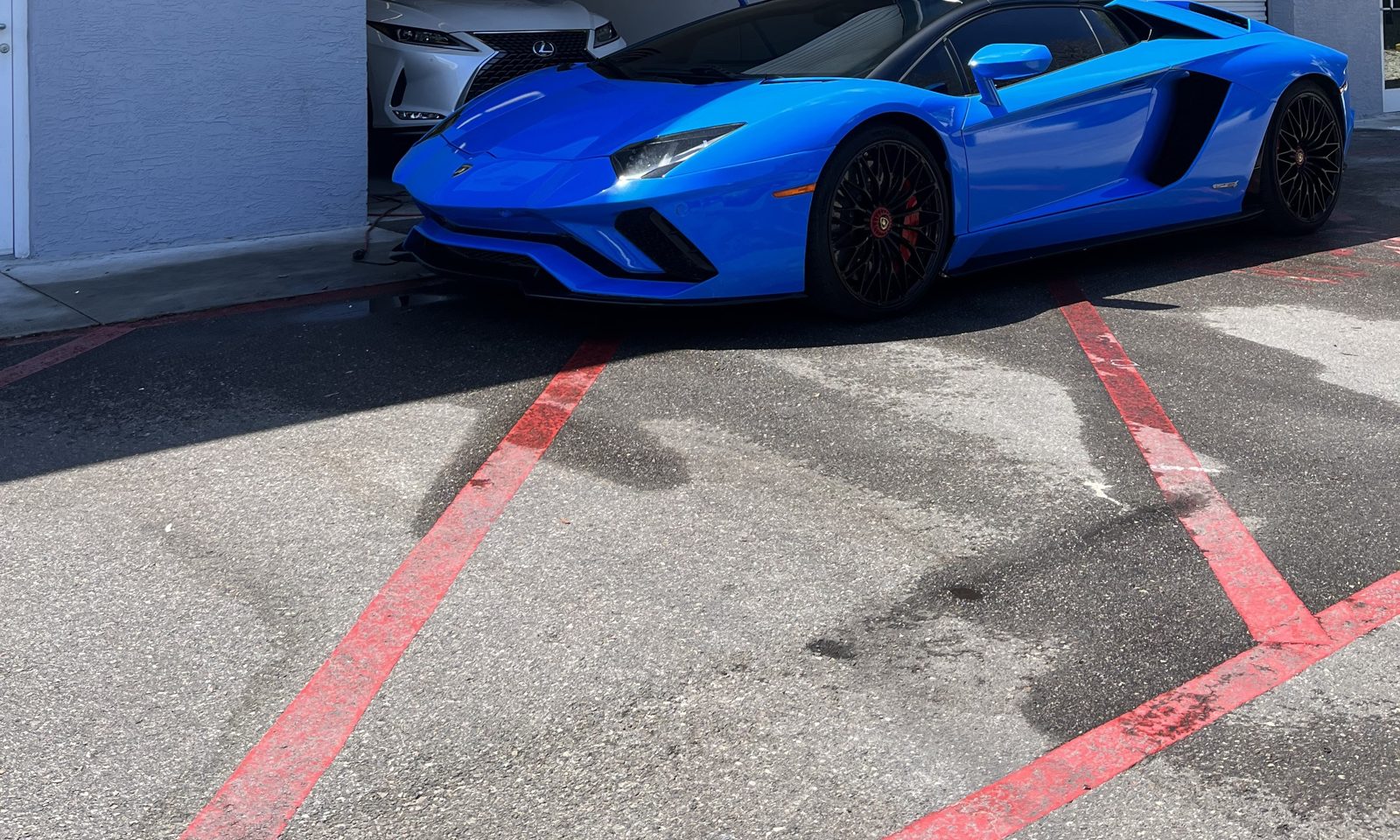 Blue Lamborghini with show-car gloss after mobile detailing near Baltimore