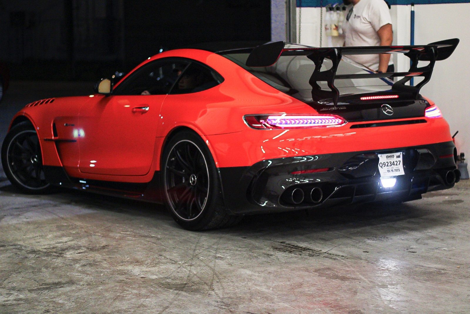 Show-car gloss on a freshly detailed red Mercedes-AMG