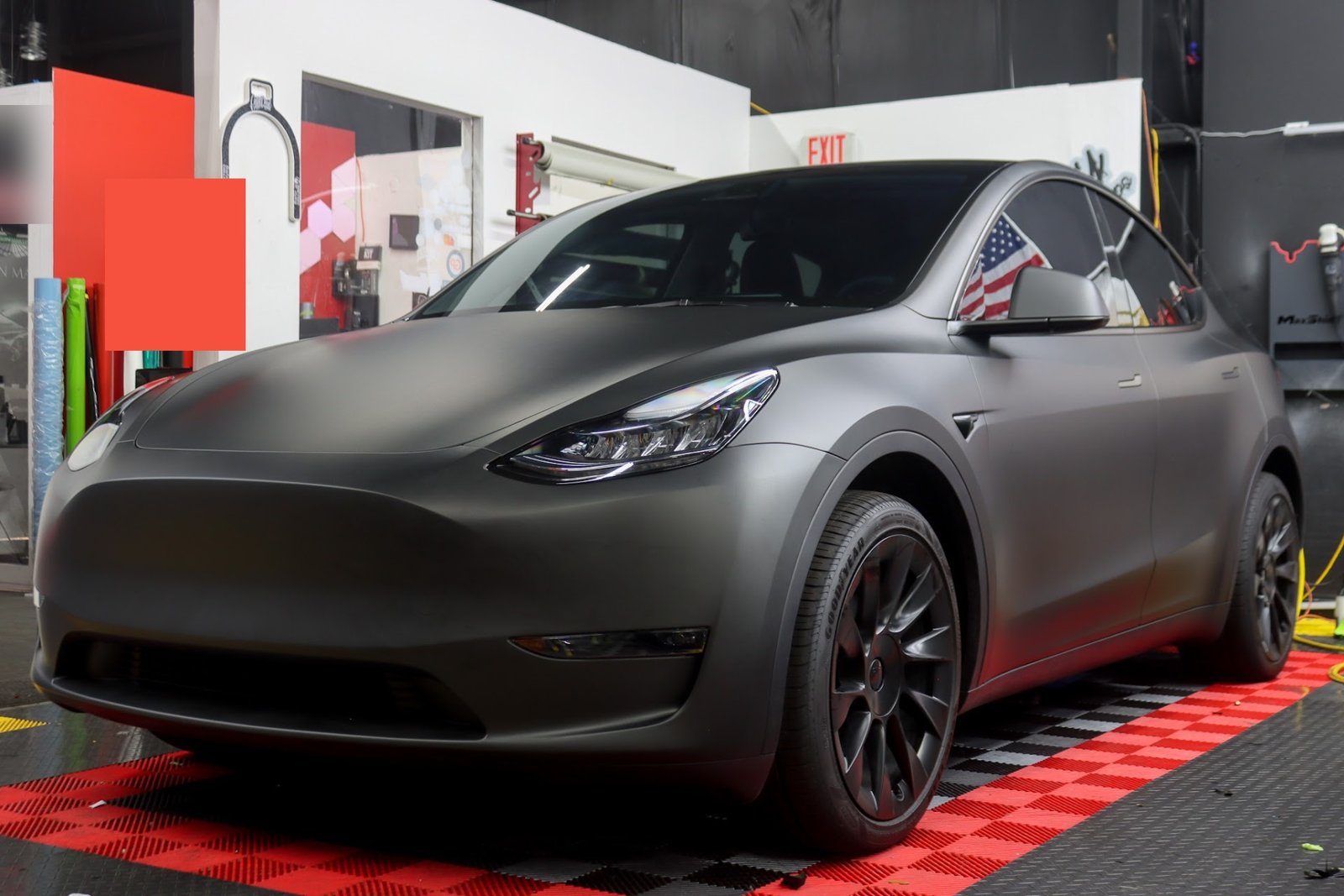 Matte-wrapped Tesla after mobile ceramic coating and paint correction in Baltimore